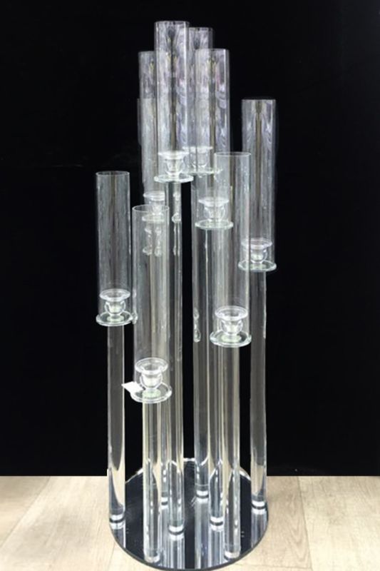 Elegant clear glass candelabra with 10 varying height candle holders, perfect for weddings and home decor.