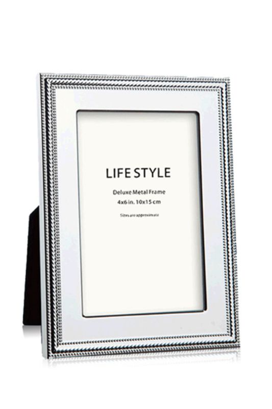 Set of 4 elegant silver plated photo frames, each 14x19cm, ideal for displaying cherished memories in style.
