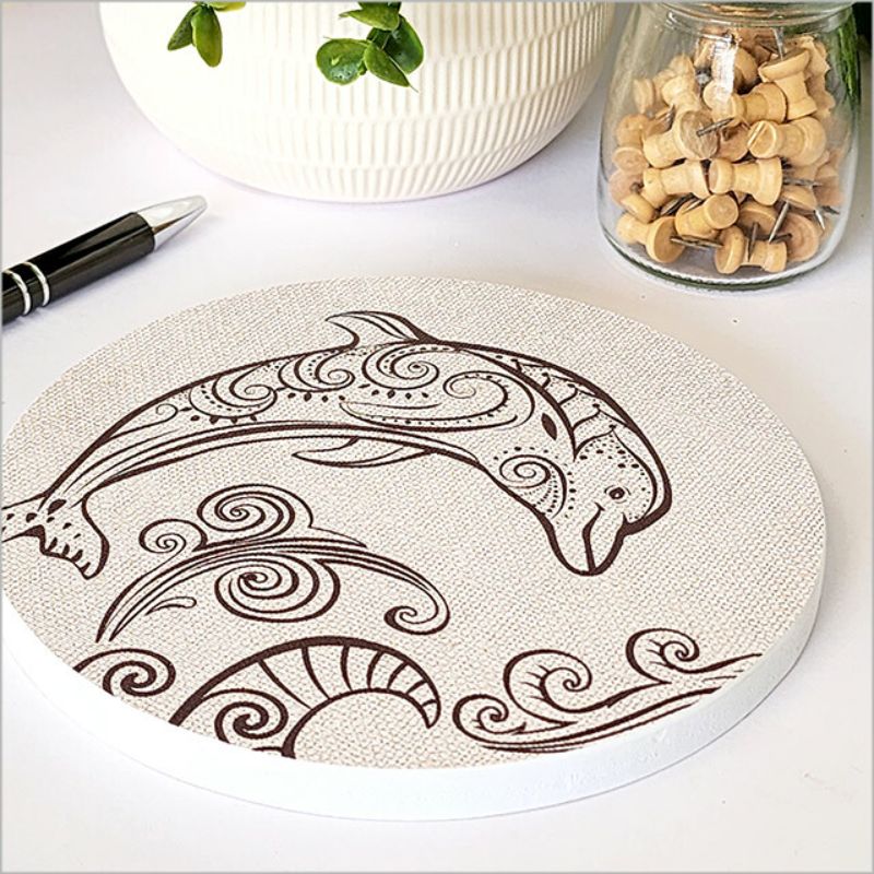 Circular canvas wall art featuring a vibrant dolphin design, perfect for marine enthusiasts and home decor lovers.