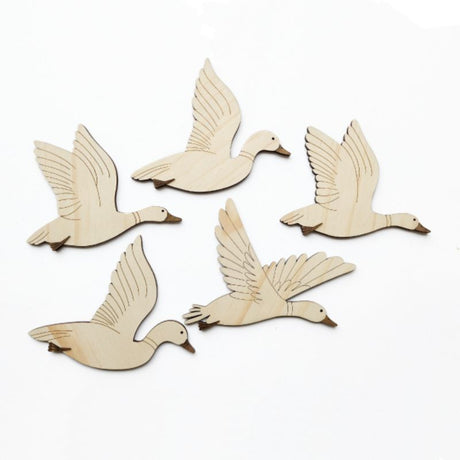 Intricately laser-cut pine veneer ducks enhance any decor, adding rustic charm and a touch of nature's elegance.