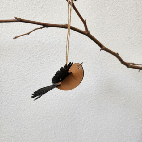 Laser-cut Rimu Fantail ornament with 3D wings, ready to hang, showcasing New Zealand's native wildlife.