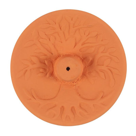 Terracotta incense plate with a detailed Tree of Life design, perfect for meditation spaces or home decor.