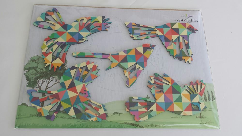 Geometric wall art featuring a flock of fantails, capturing New Zealand's beauty in a modern and vibrant design.