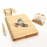 NZ Silver Beech and Bamboo Veneer notebook with a geometric fantail design, perfect for eco-friendly journaling and note-taking.