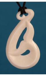 Hand-carved pendant featuring a whale tail, made from ethically sourced beef bone, symbolizing ocean conservation and freedom.
