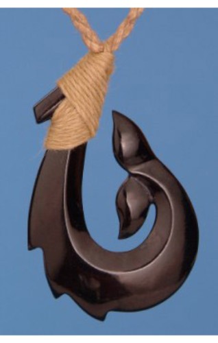 Bone whale tail pendant carved from beef bone with black stain, symbolizing strength and good fortune on a brown cord.