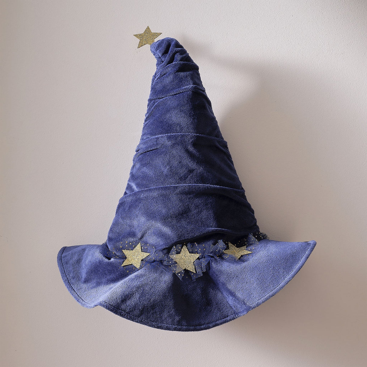 Navy velvet wizard hat with gold stars and tulle accents, perfect for imaginative play and sustainable dressing up.