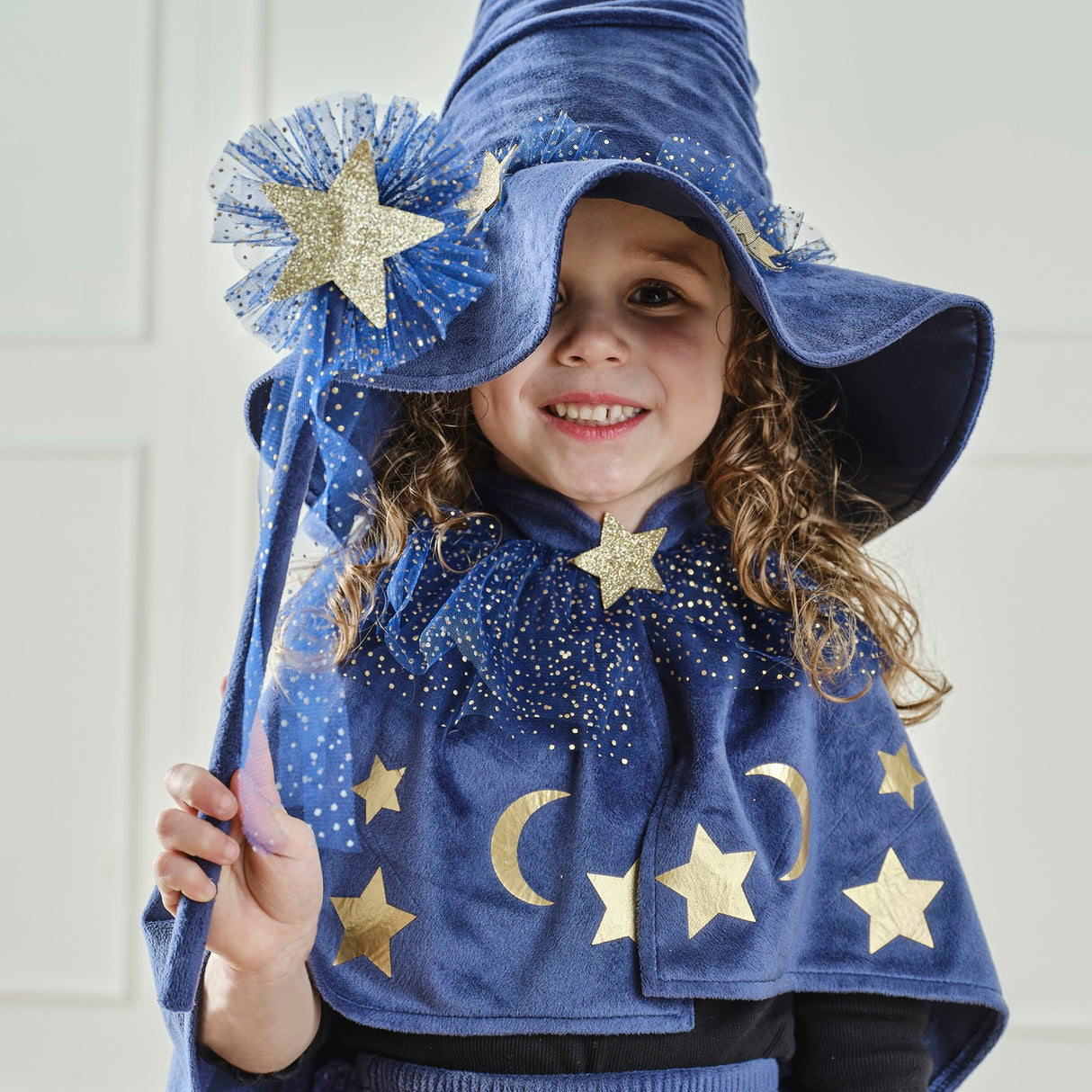 Navy tulle wizard wand adorned with a gold star and flowing ribbon, perfect for imaginative dress-up play.