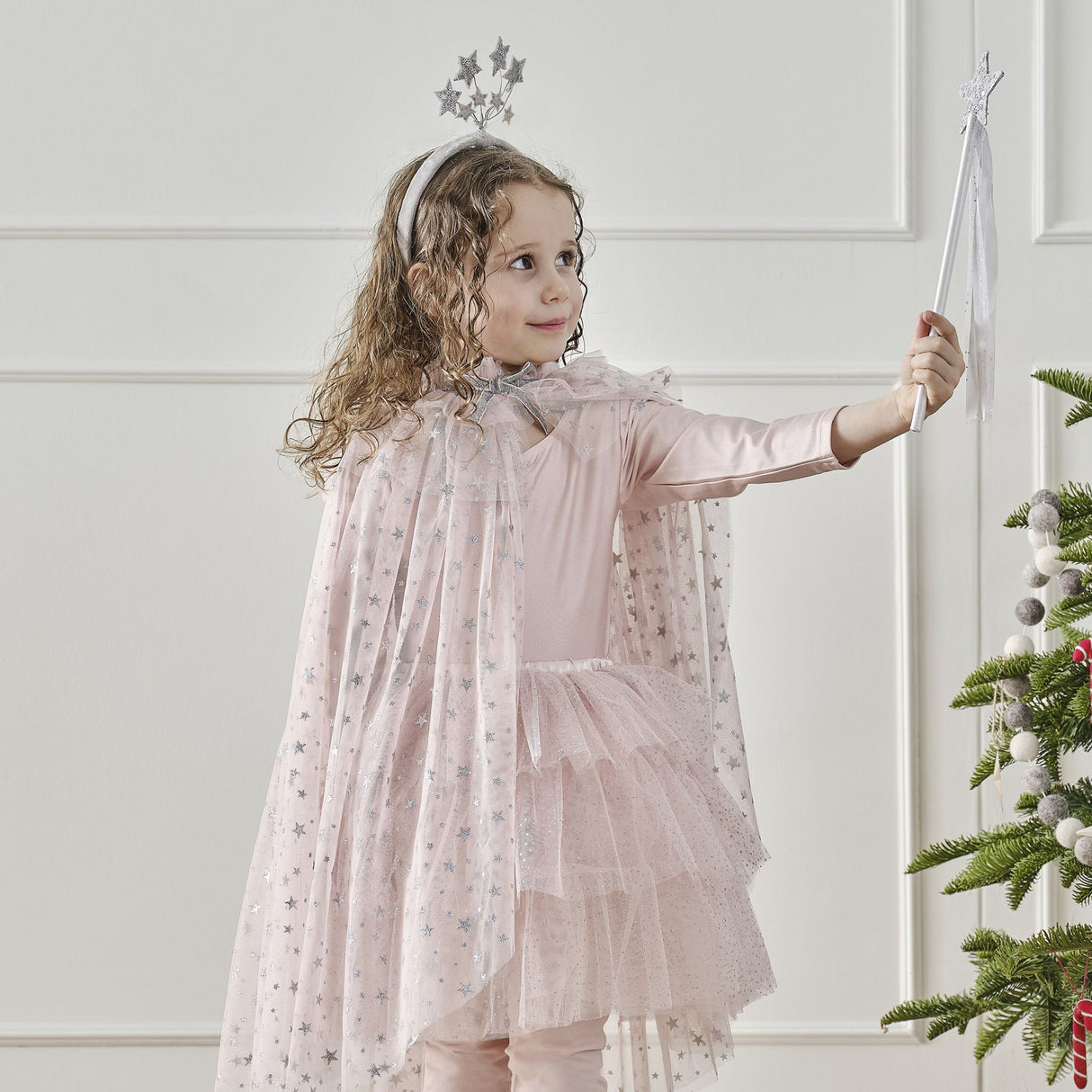 Enchanted pink satin fairy wand with a sparkling silver sequin star and soft ribbons, perfect for magical dress-up adventures.