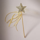 Golden satin fairy wand with a glitter star, ideal for parties and imaginative play, in eco-friendly packaging.