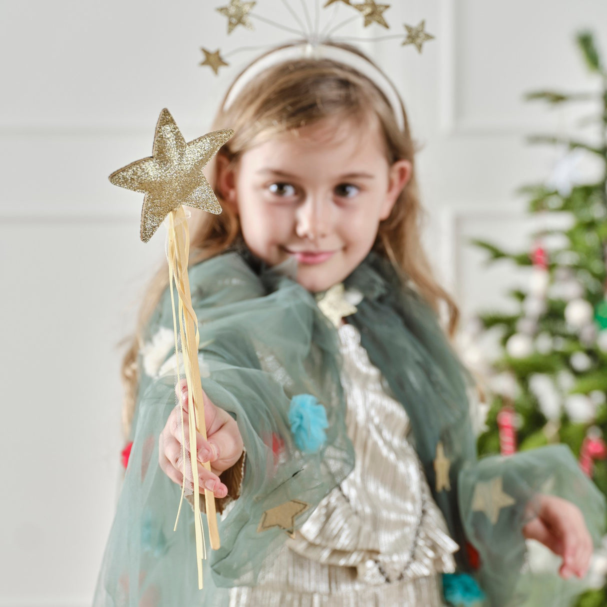 Gold satin fairy wand with dazzling glitter star, perfect for imaginative play and eco-friendly celebrations.