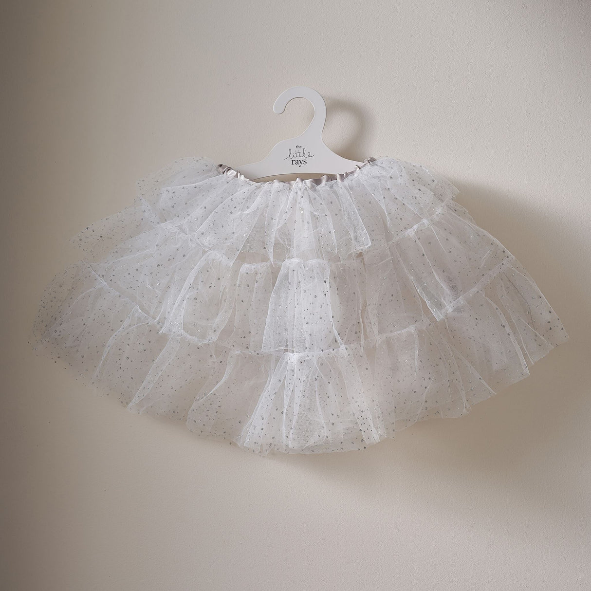 Whimsical white and silver sparkle tutu for ages 3-5, perfect for fairy princess dress-up and imaginative play.