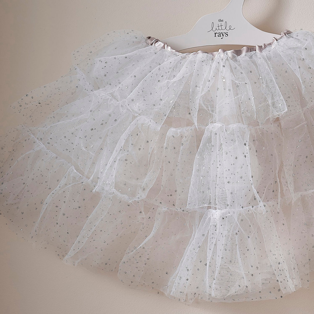 Fairy princess costume tutu featuring white tulle and silver sparkles, perfect for imaginative play for ages 3-5.