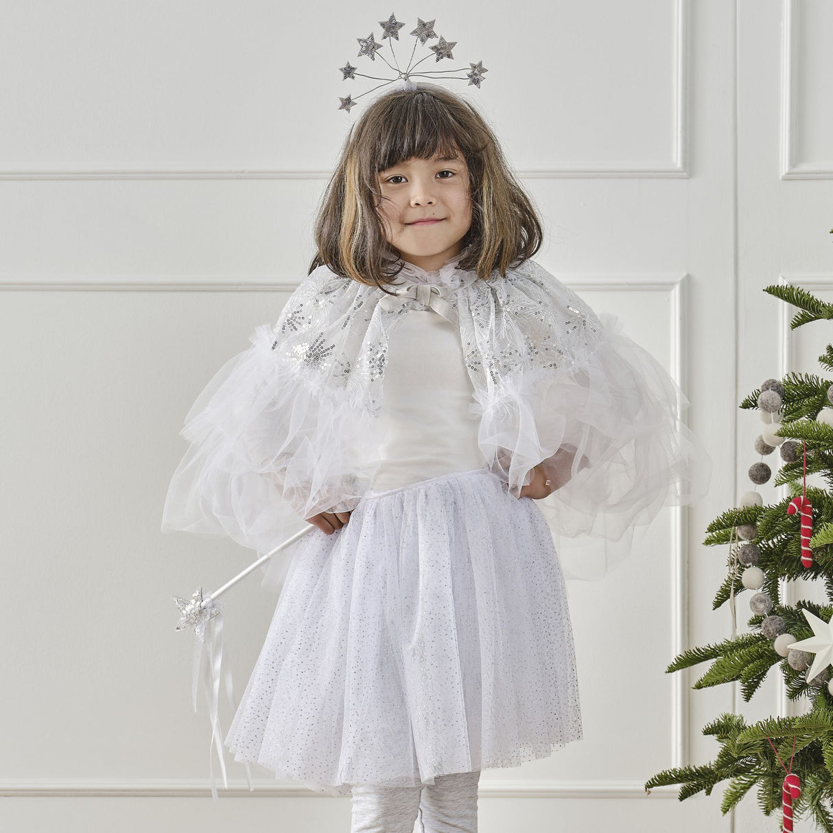 Fairy princess costume tutu in white and silver, featuring soft tulle and a satin waistband, perfect for imaginative play.