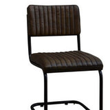 Elegant leather dining chair with mid-century design, foam-filled comfort, and sturdy metal frame, perfect for any decor.