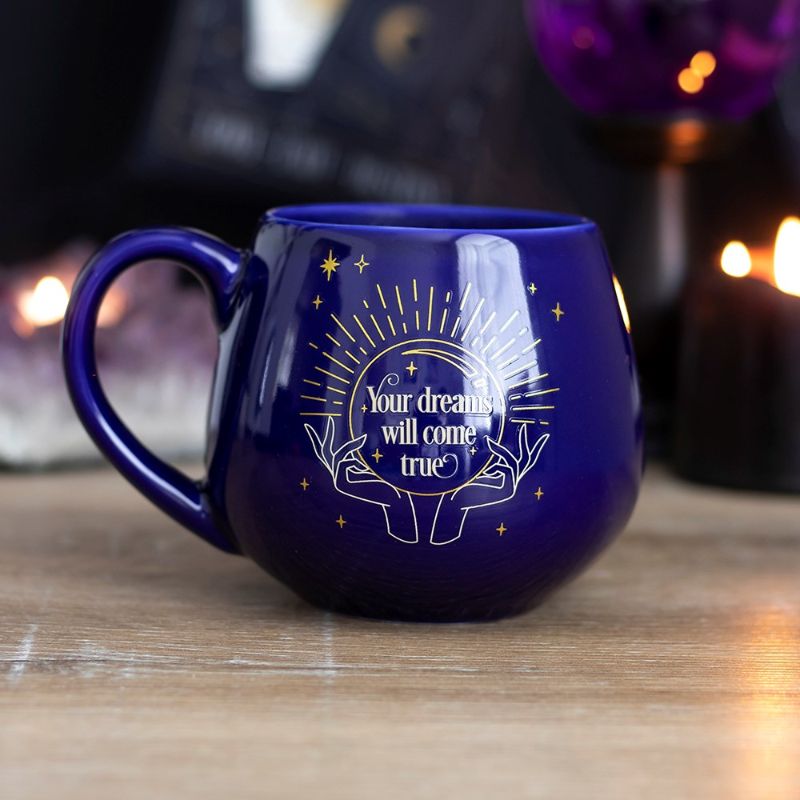 Colour changing blue mug with mystical crystal ball reveals hidden fortune text when filled with a warm beverage.