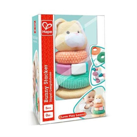 Colorful Hape Bunny Stacker toy with a friendly rabbit head, textured rings, and a wobbling base for sensory play and motor skill development.