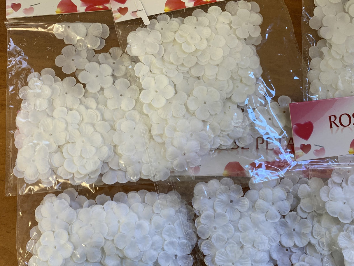 White faux flower petals in 6-pack bundle, perfect for weddings and romantic occasions, offering elegant decor without mess.