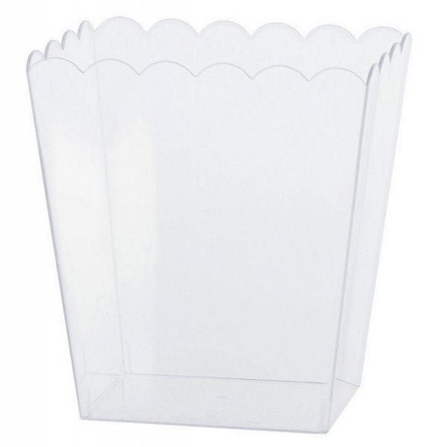 Small clear scalloped plastic container for stylish organization of craft supplies, kitchen items, or small toys.