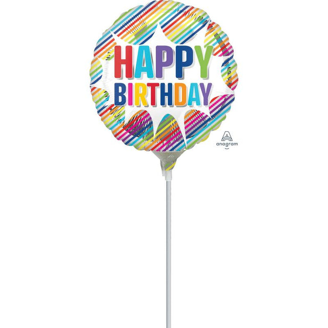 Vibrant 22cm foil balloon featuring a striped burst design, perfect for adding festive flair to birthday celebrations.