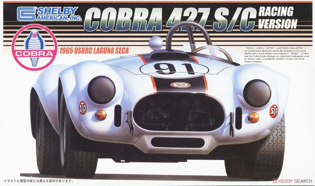 Unassembled Fujimi 1/24 scale Shelby Cobra 427 S/C model kit, showcasing classic American muscle car design for hobbyists.