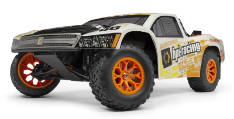 High-speed 1/10 RC truck with durable aluminum chassis, FLUX motor, 2.4 GHz radio, and all-terrain tires for off-road racing.