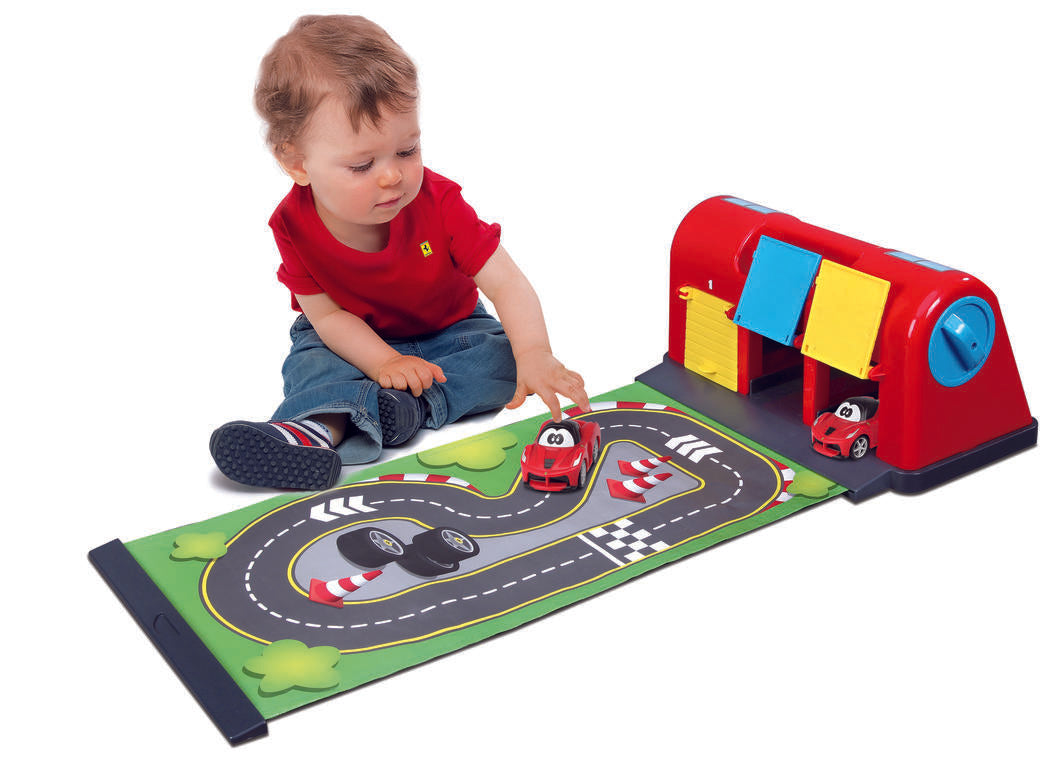 Colorful BB Junior Ferrari Roll Away Raceway playset with retractable mat, LaFerrari model, and three parking spaces for imaginative play.