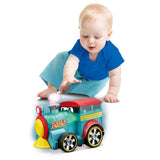 Colorful push toy train with glowing lights and sounds, promoting imaginative play and sensory development for toddlers.