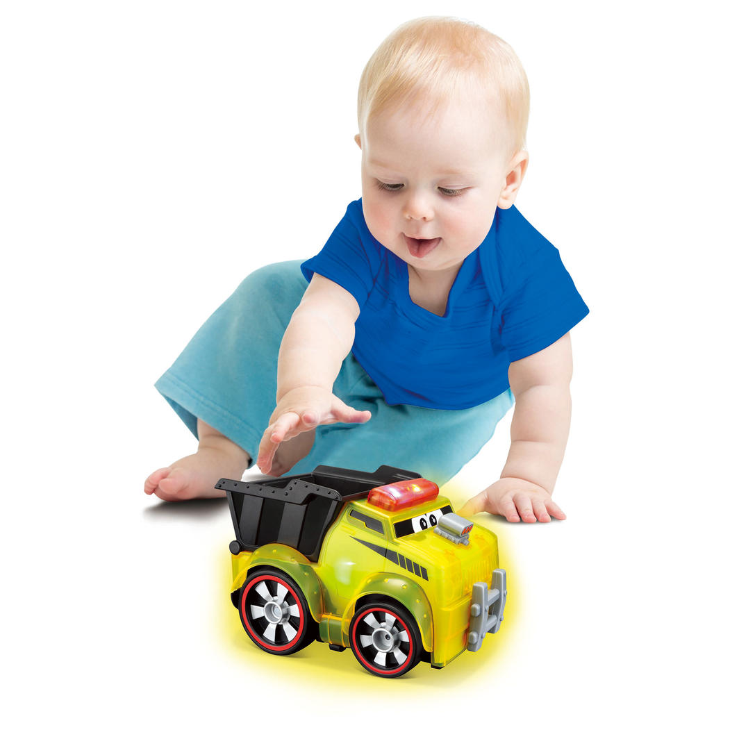 Vibrant BB Junior Push & Glow Dump Truck with glowing body and playful sounds, designed for toddlers' imaginative play and motor skill development.