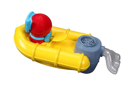 Child-friendly floating rescue raft toy with bubble-making feature and included diver figure for imaginative water adventures.