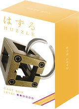 Huzzle Puzzle: Box (Lv2) featuring a tangled ring in a cubic frame for adults, promoting logic and problem-solving skills.