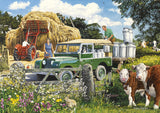 A 4x500-piece puzzle set featuring vibrant rural scenes by artist Trevor Mitchell, crafted from 100% recycled board.