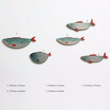 Wall Art Set of 5 Fish on brushed silver, ideal for coastal decor, perfect for indoor and covered outdoor spaces.