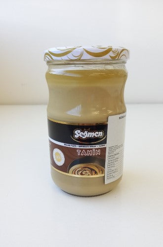 Smooth and flavorful Tahini 600gm Segmen made from hulled sesame seeds, perfect for cooking and gourmet dishes.