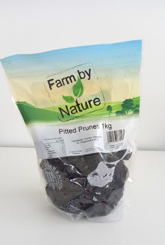 A 1kg packet of pitted prunes, rich in fiber and natural sweetness, ideal for snacking or as an ingredient in recipes.