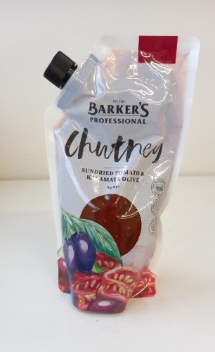 A 1kg packet of Barkers Chutney featuring sundried tomatoes and Kalamata olives, perfect for enhancing savory dishes.