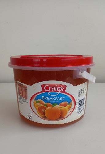 A generous tub of Craigs 2.5kg Jam Marmalade, bursting with tangy citrus flavor for breakfast spreads and indulgent treats.