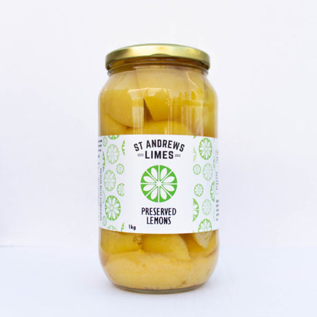 Vibrant 1kg jar of St Andrews preserved lemons, perfect for enhancing Mediterranean dishes and adding zesty flavor.