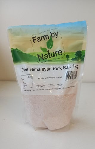 Himalayan pink fine salt in a 1kg packet, rich in minerals and perfect for enhancing flavors in cooking and baking.