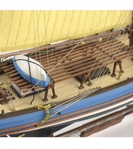 A detailed 1:50 scale wooden model of the traditional French tuna fishing boat, Marie Jeanne, perfect for display and modelers.