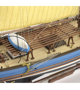 A detailed 1:50 scale wooden model of the traditional French tuna fishing boat, Marie Jeanne, perfect for display and modelers.