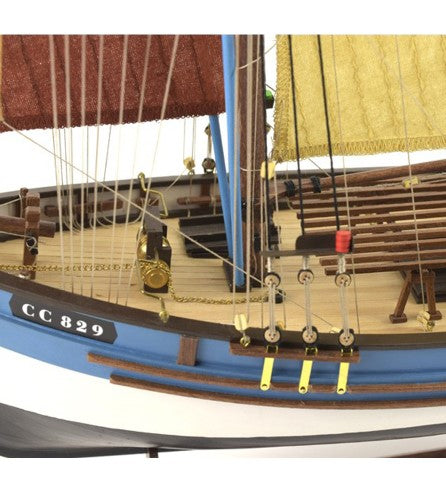 Detailed 1:50 scale wooden model of the French tuna fishing boat Marie Jeanne, featuring pre-cut parts and hand-sewn sails.