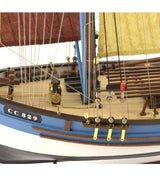 Detailed 1:50 scale wooden model of the French tuna fishing boat Marie Jeanne, featuring pre-cut parts and hand-sewn sails.