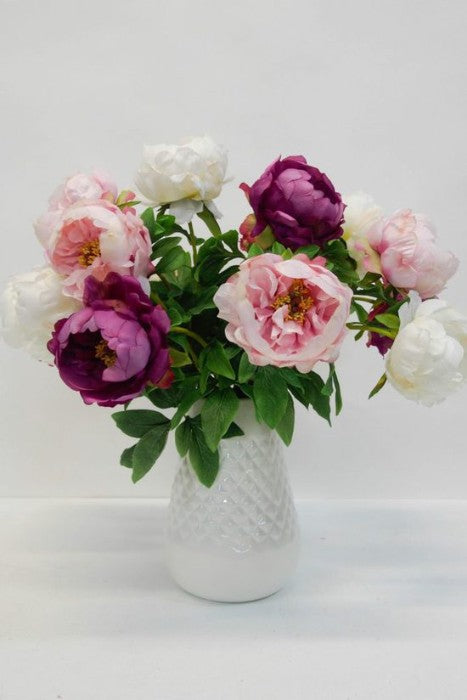 Lifelike white artificial peony with soft cupped petals, 56cm tall, perfect for elegant floral arrangements and decor.