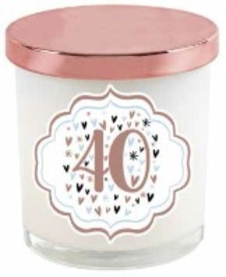 Pastel heart-shaped candle with rose gold lid, perfect for 40th birthday celebrations and elegant home decor.