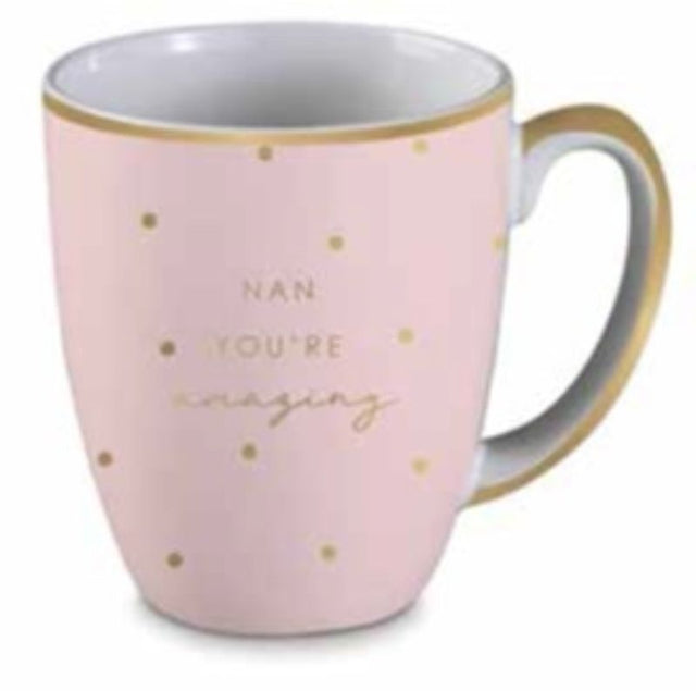 Elegant pink and gold ceramic mug with "You're Amazing" design, perfect for daily inspiration and enjoyable beverages.