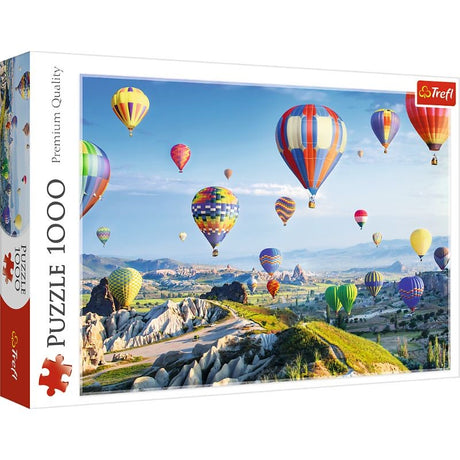 Trefl "1000" puzzle showcasing Cappadocia's stunning landscape with hot air balloons and unique rock formations.