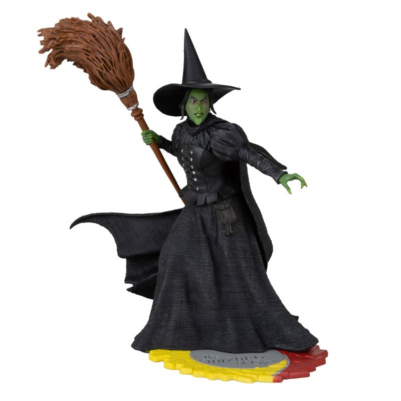 6-inch Wicked Witch of the West figurine with vibrant colors, detailed features, and scenic backdrop, ideal for collectors.