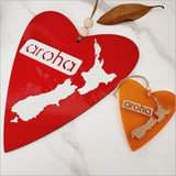 Heart-shaped Kiwiana Wall Art featuring Aroha symbol, crafted from ACM, ideal for enhancing any room's decor.