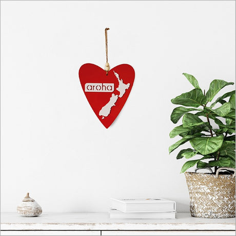 Heart-shaped Kiwiana wall art in white, made from ACM, celebrating love and Kiwi culture, perfect for any room.